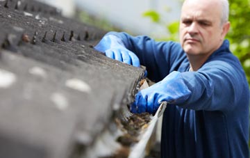 cleaning and inspecting Calais Street roofs